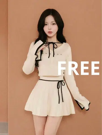 다리치 허리 오픈 리본 디자인 니트 미니 원피스