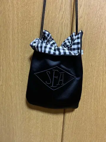 SEA REVERSIBLE SHOULDER BAG