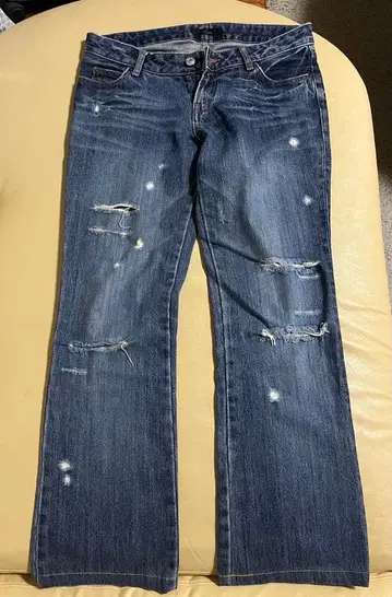 여성용 데미지 가공 부츠컷 데님 인터플래닛