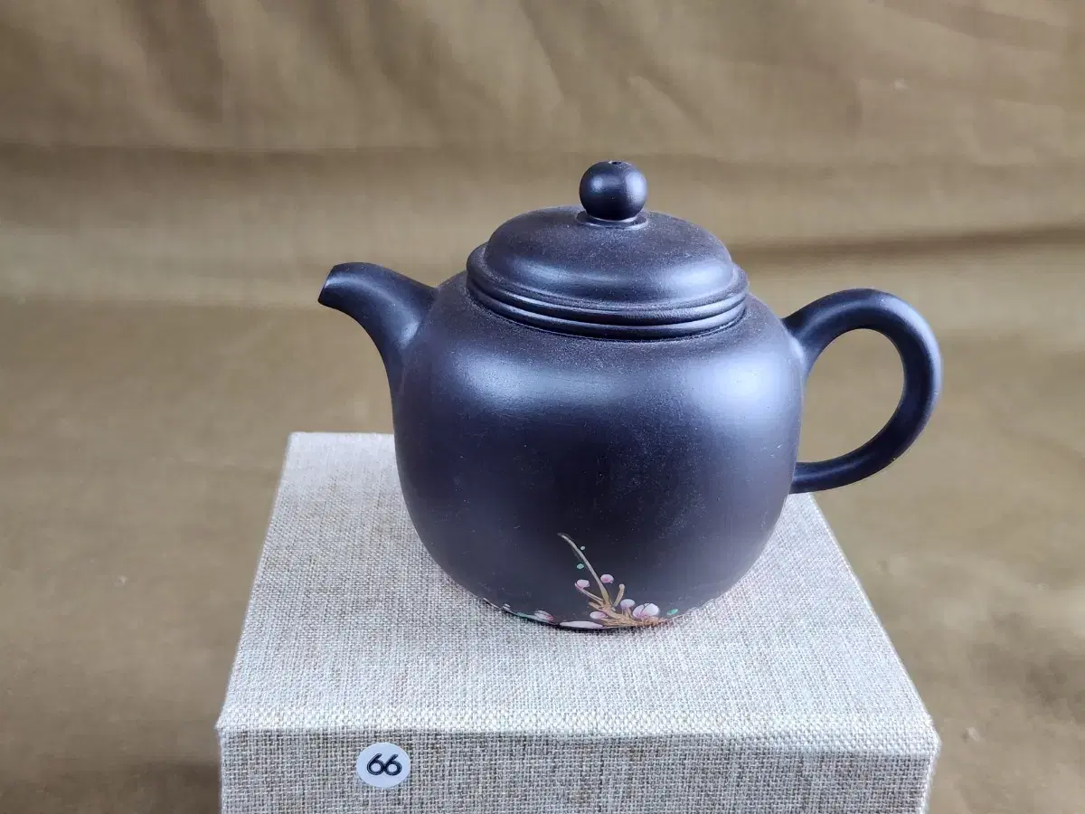 Chinese porcelain, characterized by plum blossom paintings on the bottom