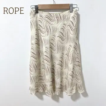 로페 무릎 기장 플레어 스커트 도트 무늬 올 패턴 화이트 안감 있음