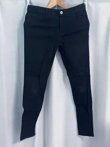LEATHER TAG SKINNY PANTS