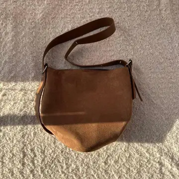 베이지색 가죽 가방