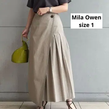MilaOwen 스코치 단추 턱 디테일 랩 스커트 베이지 올 시즌