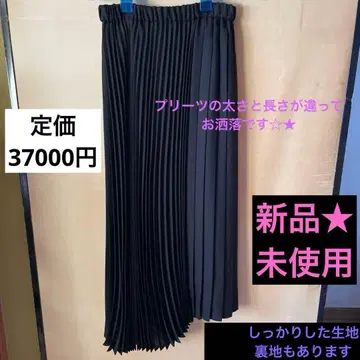 미사용 새상품 에센 로트레아몽 비대칭 플리츠 스커트 블랙