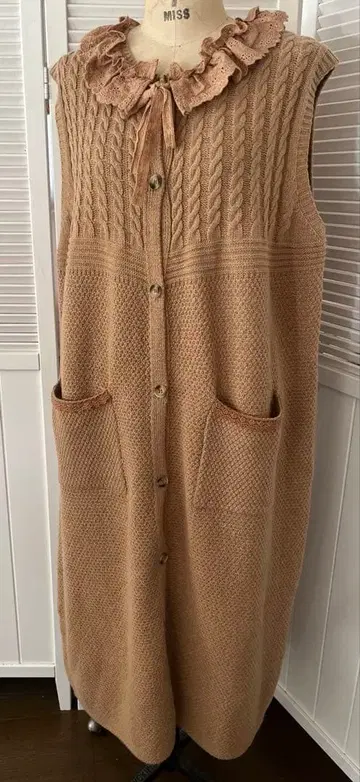 니트 슬리브리스 가디건