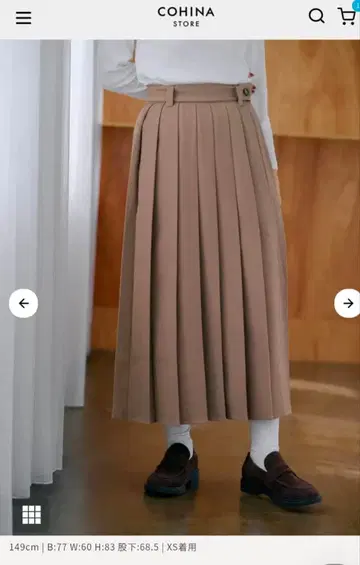 COHINA 버튼 벨트 플리츠 스커트