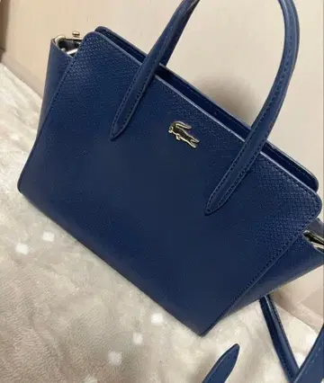 라코스테 숄더백