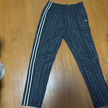 인기 라코스테 모노그램 트랙 팬츠