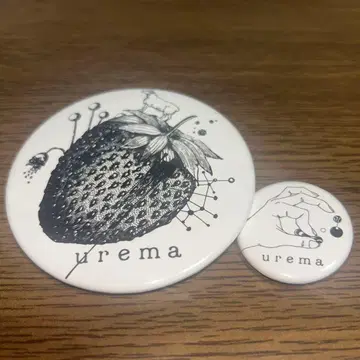 urema 캔뱃지 2개