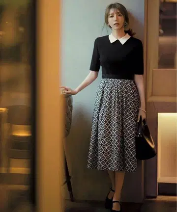 드레 스테리아 오버랩 바이컬러 니트 콤비 플레어 원피스 블랙