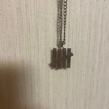 UNDEFEATED 언디피티드 목걸이