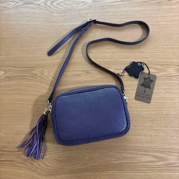 [모드풀레] 이탈리안 카프 태슬 부착 미니 숄더백