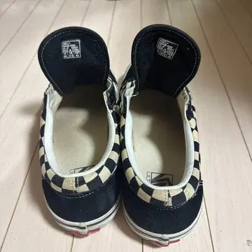 Vans 체크 무늬 슬립온 스니커즈