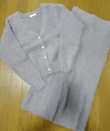 PROPORTION BODY DRESSING 아이렛 페더 니트 업