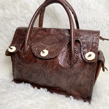 그레이스 콘티넨탈 카빙 트라이브스 천연 가죽 토트백