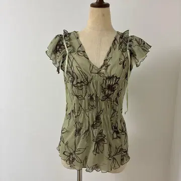 꽃무늬 프릴 소매 슬리브리스 셔츠