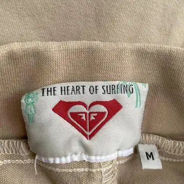 ROXY 베이지 미니 스커트 록시