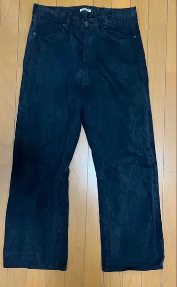 AURALEE SELVEDGE FADED LIGHT DENIM PANTS