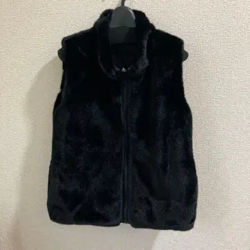 인조 모피와 나일론의 다운 베스트 블랙 리버서블