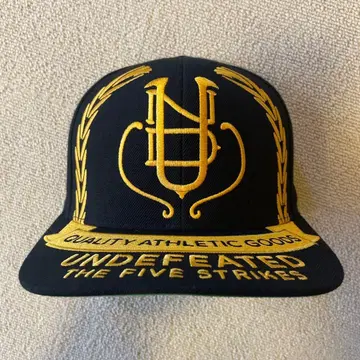 Undefeated 스냅백 캡