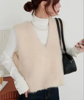 Discoat 디스코트 앞뒤 2way 페더얀 숏 기장 베스트