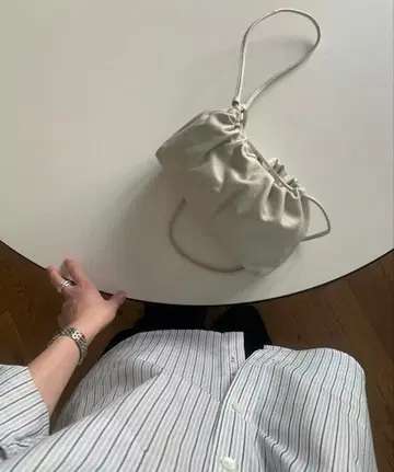 fl lanel leather string bag