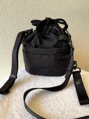 마스터피스 브라운 통 모티브 숄더백 블랙