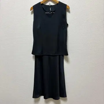 [style.com] 슬리브리스 무릎 기장 스커트 셋업 블랙