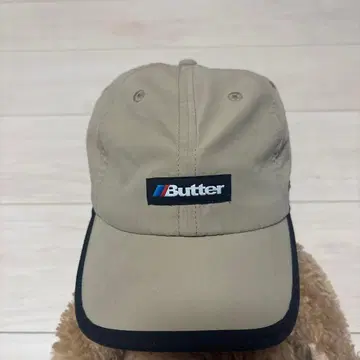 Butter 베이지 캡 로고