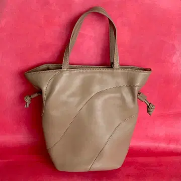 Laumeomi..베이지 곡선 디자인 핸드백