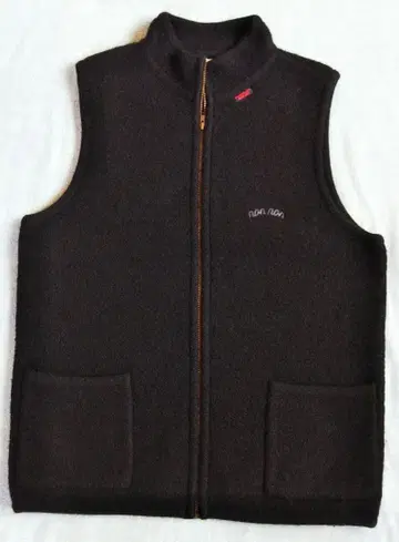 마드모아젤 논논 압축 울 니트 하이넥 베스트 집업 블랙