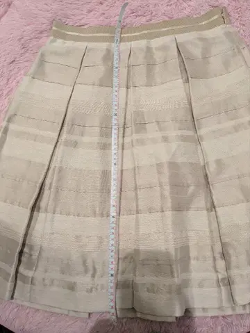 UNTITLED 베이지 플리츠 스커트