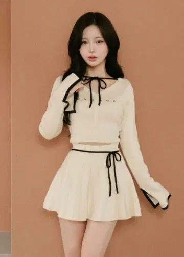 [라스트 1점] 다리치 허리 오픈 리본 디자인 니트 미니 원피스