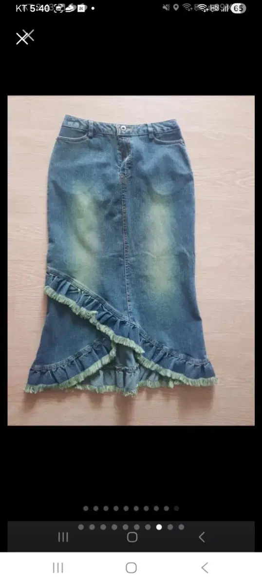 Blue denim long skirt with ruffle trim, size 55