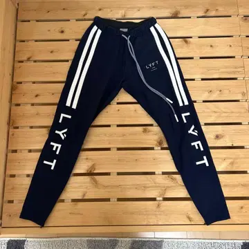 LYFT HALF CUT 2LINE PANTS 사이드 로고 네이비