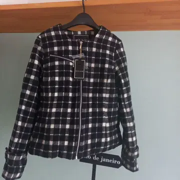 체크 무늬 노카라 자켓