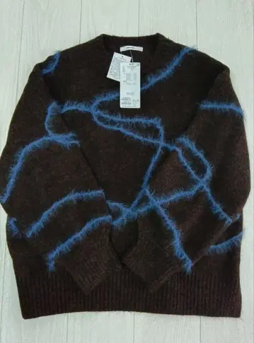 디스코트 멜란지얀 선 패턴 풀오버