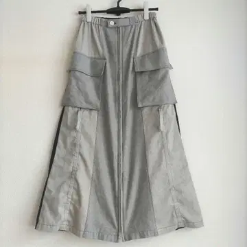 CRESCENT DUO 롱 스커트 이소재 절개