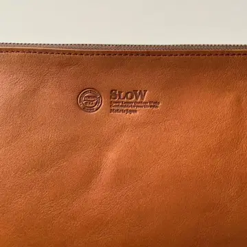 SLOW 브라운 가죽 클러치백 도치기 가죽
