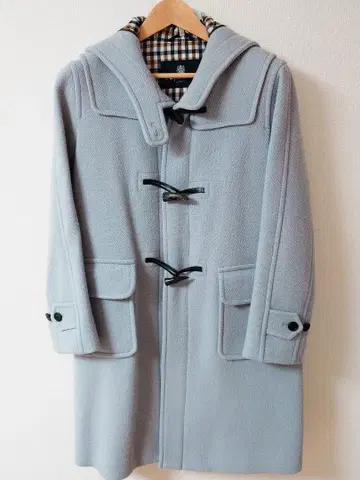 아쿠아 스큐텀 더플 코트 아이스 블루 후드 부착