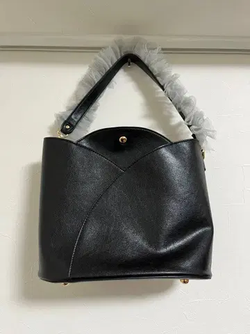 노트르 에모아 프릴 핸들 백