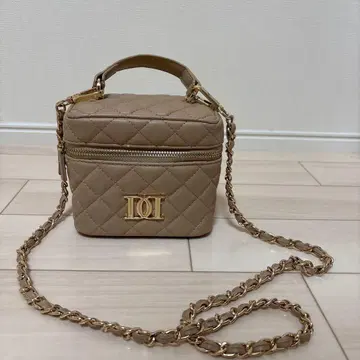 베이지 퀼팅 숄더백 다리치