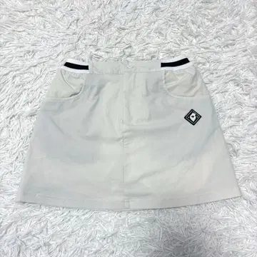 V12 골프 스커트 사다리꼴 화이트 숏 골프웨어 방풍