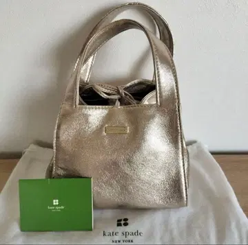 kate spade 골드 핸드백