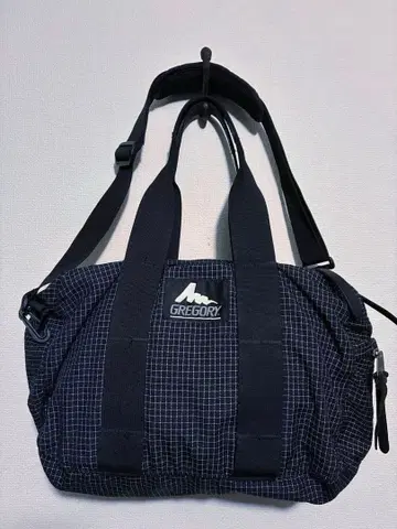Gregory 더플백. 구형 로고