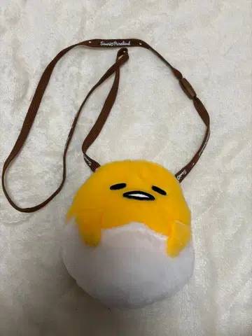 산리오 퓨로랜드 구데타마 패스케이스 파우치 미니백