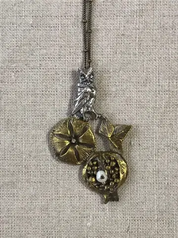 올빼미와 석류의 목걸이