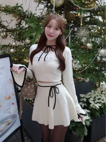 Darich 허리 오픈 리본 디자인 니트 미니 원피스 IVO