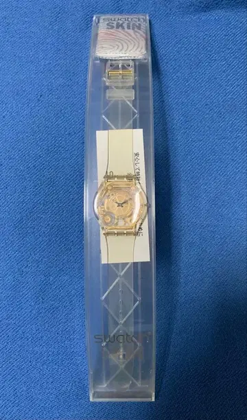 swatch SKIN 손목시계 golden jelly